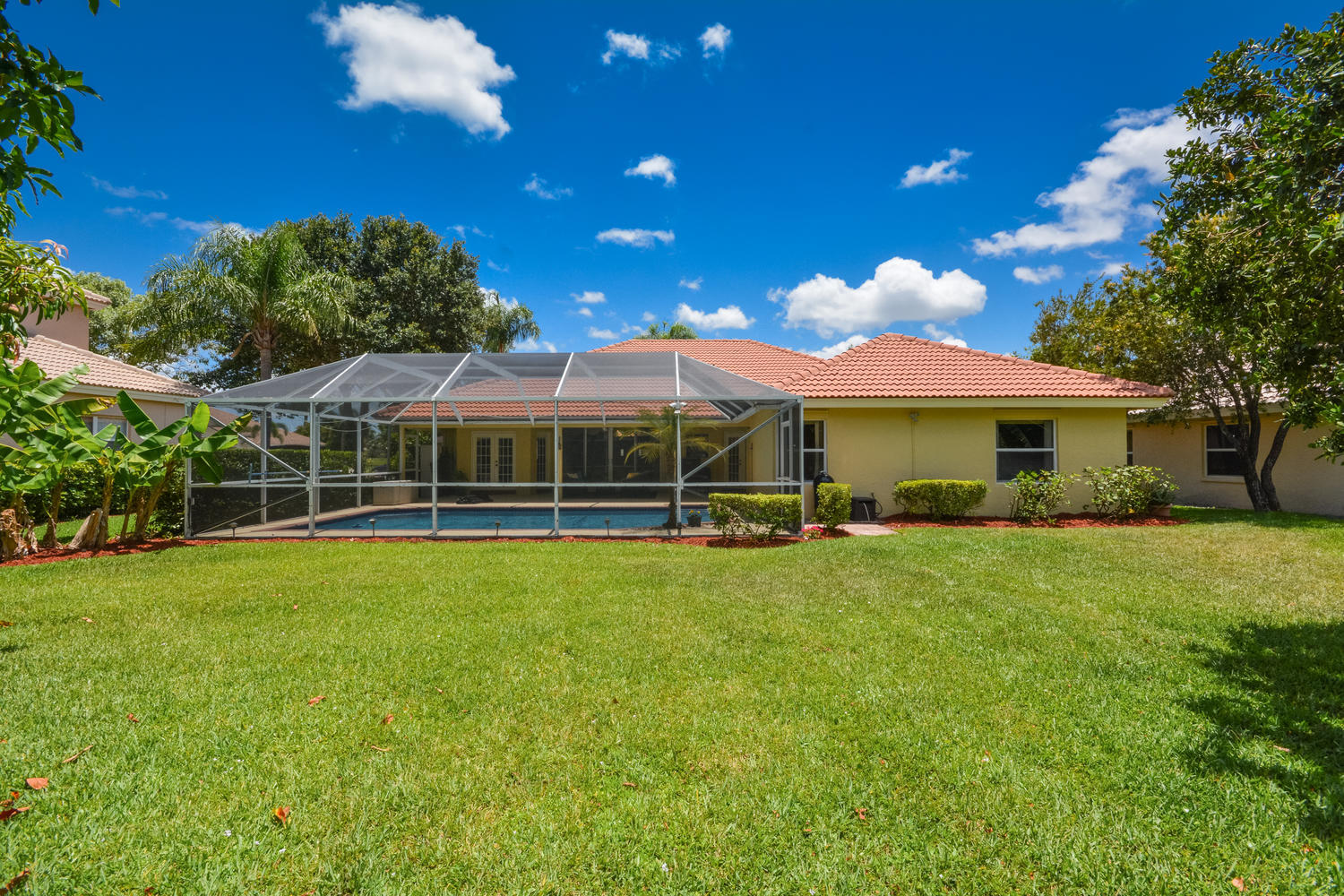 18702 Cape Sable Drive Boca Raton, FL 33498 - Photo 31 of 53 backyard to house closer