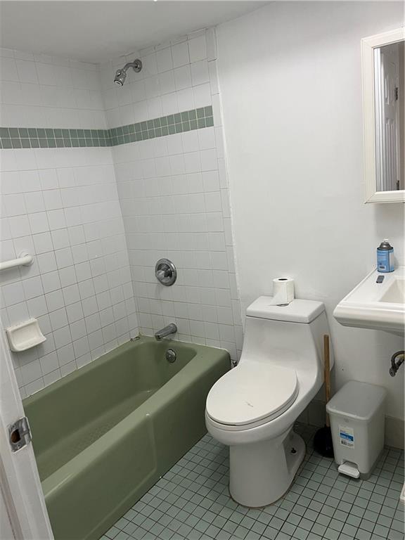 2955 Ocean Parkway, Unit BR Brooklyn, NY 11235 - Photo 5 of 6 a white toilet sitting next to a bath tub