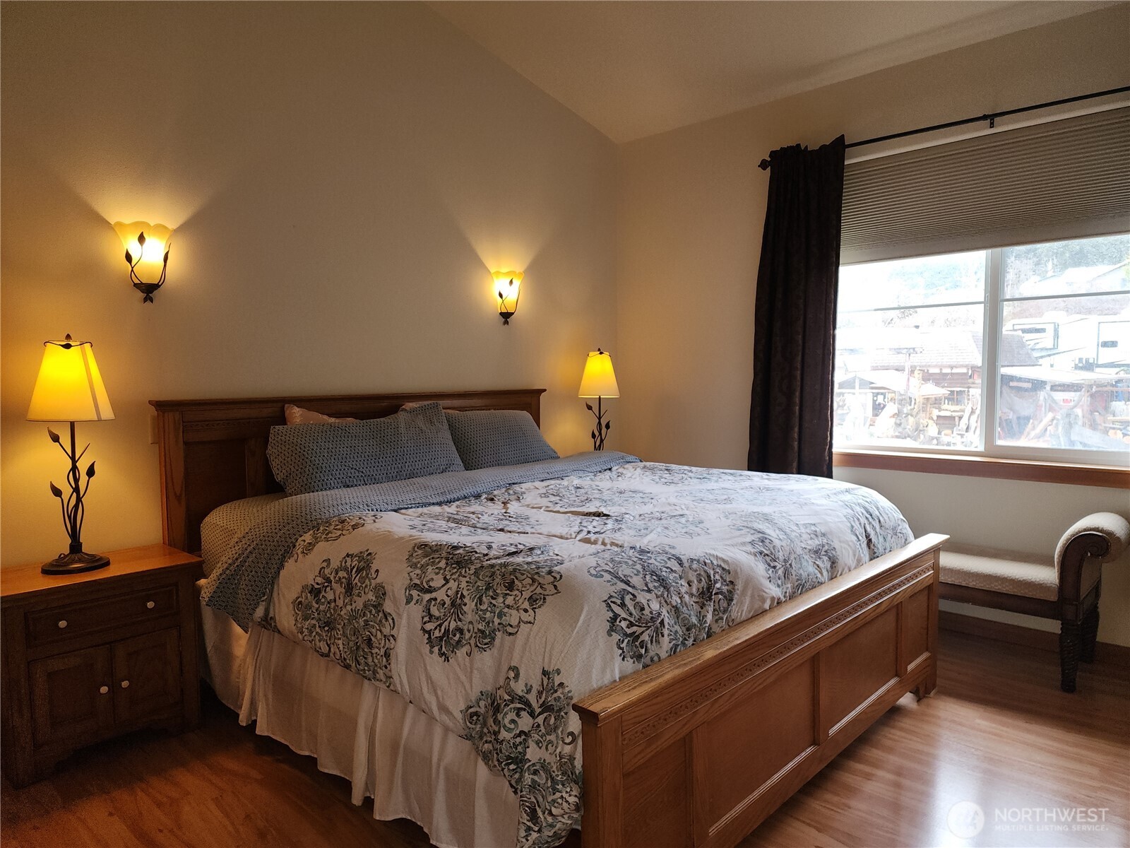 18350 Highway 3 Allyn, WA 98524 - Photo 15 of 18 a bed sitting in a bedroom next to a window