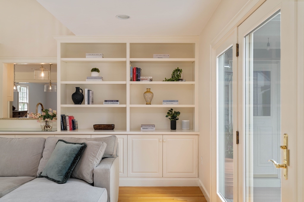 38 Fuller Brook Road Wellesley, MA 02482 - Photo 16 of 42 a living room with furniture and a painting on the wall