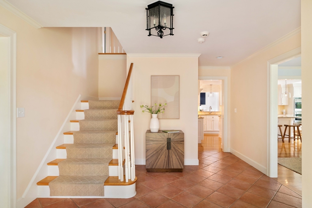 38 Fuller Brook Road Wellesley, MA 02482 - Photo 18 of 42 a view of entryway and hall with wooden floor