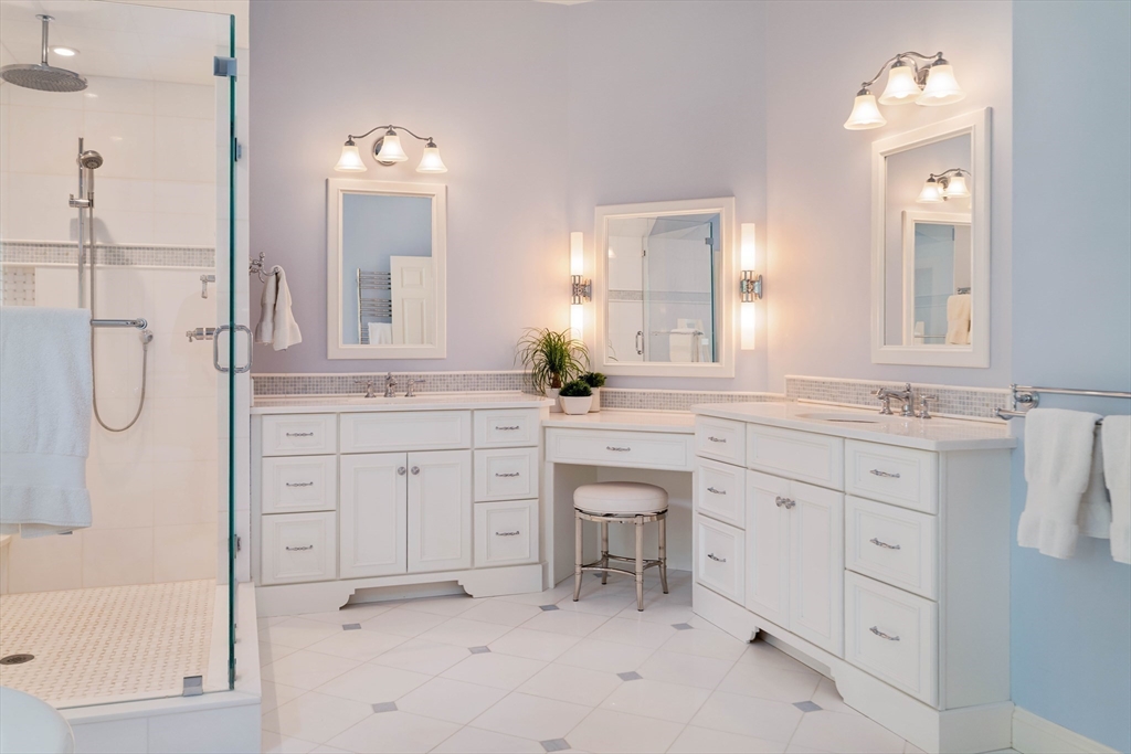 38 Fuller Brook Road Wellesley, MA 02482 - Photo 27 of 42 a bathroom with a granite countertop sink mirror and a