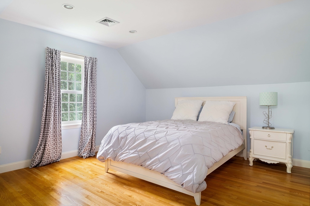 38 Fuller Brook Road Wellesley, MA 02482 - Photo 34 of 42 a bedroom with a bed and a window