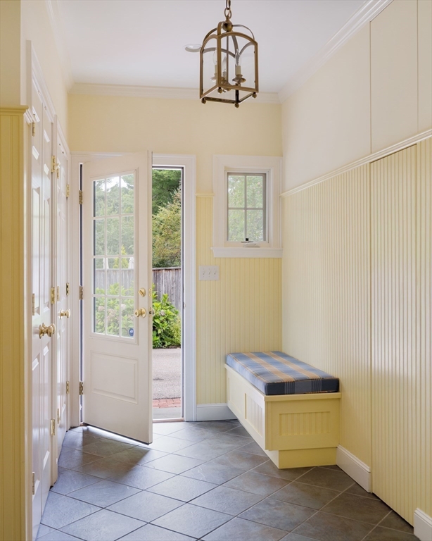 38 Fuller Brook Road Wellesley, MA 02482 - Photo 38 of 42 a living room with a ceiling fan