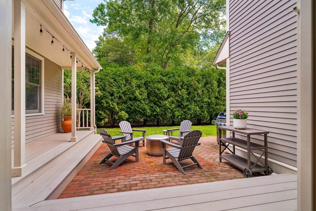 38 Fuller Brook Road Wellesley, MA 02482 - Photo 40 of 42 a view of a lounge chairs in patio of the house
