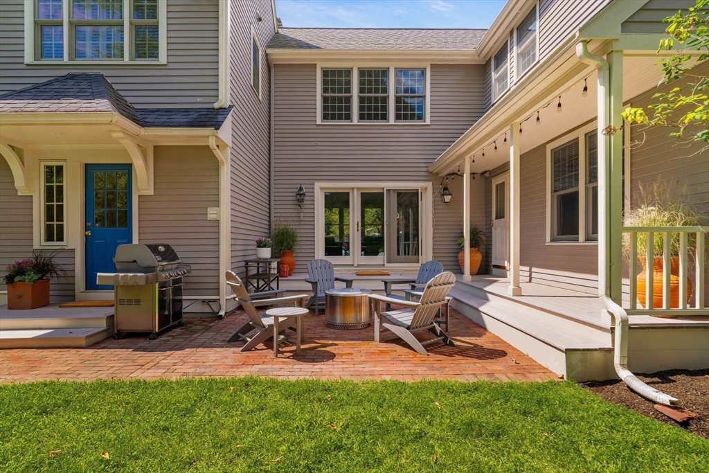 38 Fuller Brook Road Wellesley, MA 02482 - Photo 41 of 42 a view of a house with backyard porch and sitting area