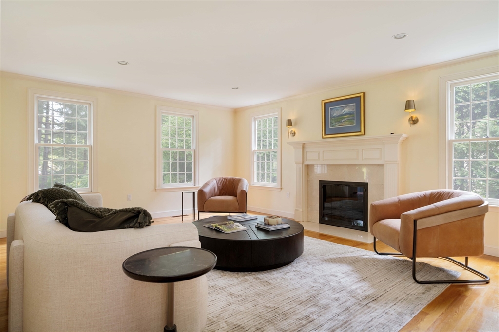 38 Fuller Brook Road Wellesley, MA 02482 - Photo 5 of 42 a living room with furniture and a fireplace