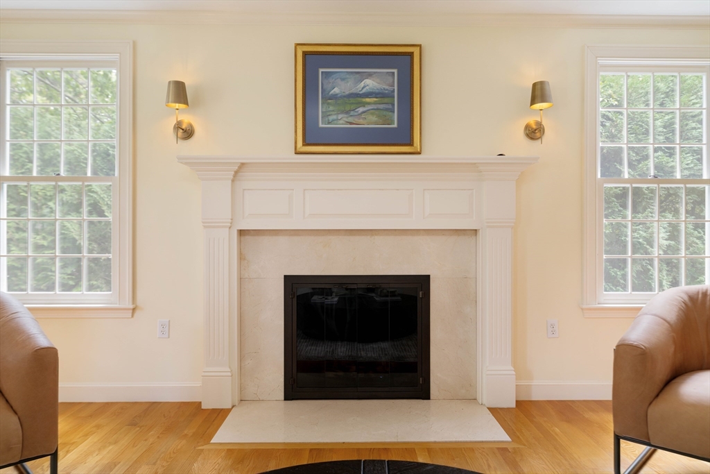 38 Fuller Brook Road Wellesley, MA 02482 - Photo 6 of 42 a living room with furniture and a fireplace