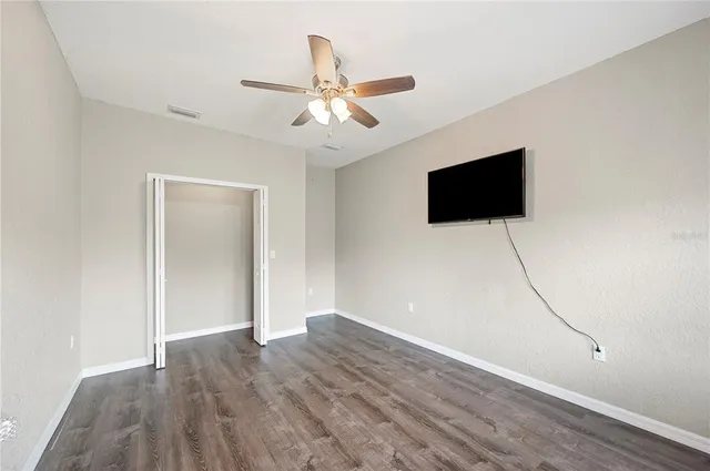 a view of a livingroom with a flat screen tv