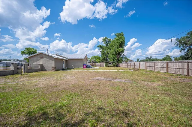 a front view of house with yard and entertaining space