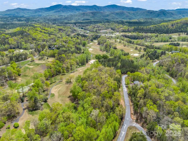 a view of a houses with a yard