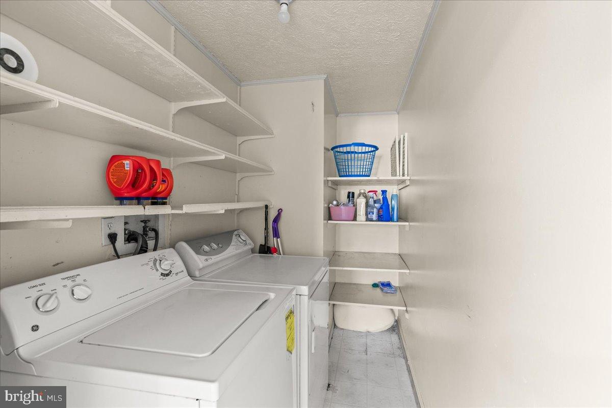 9442 Brentsville Road Manassas, VA 20112 - Photo 15 of 34 Bright and functional laundry space.