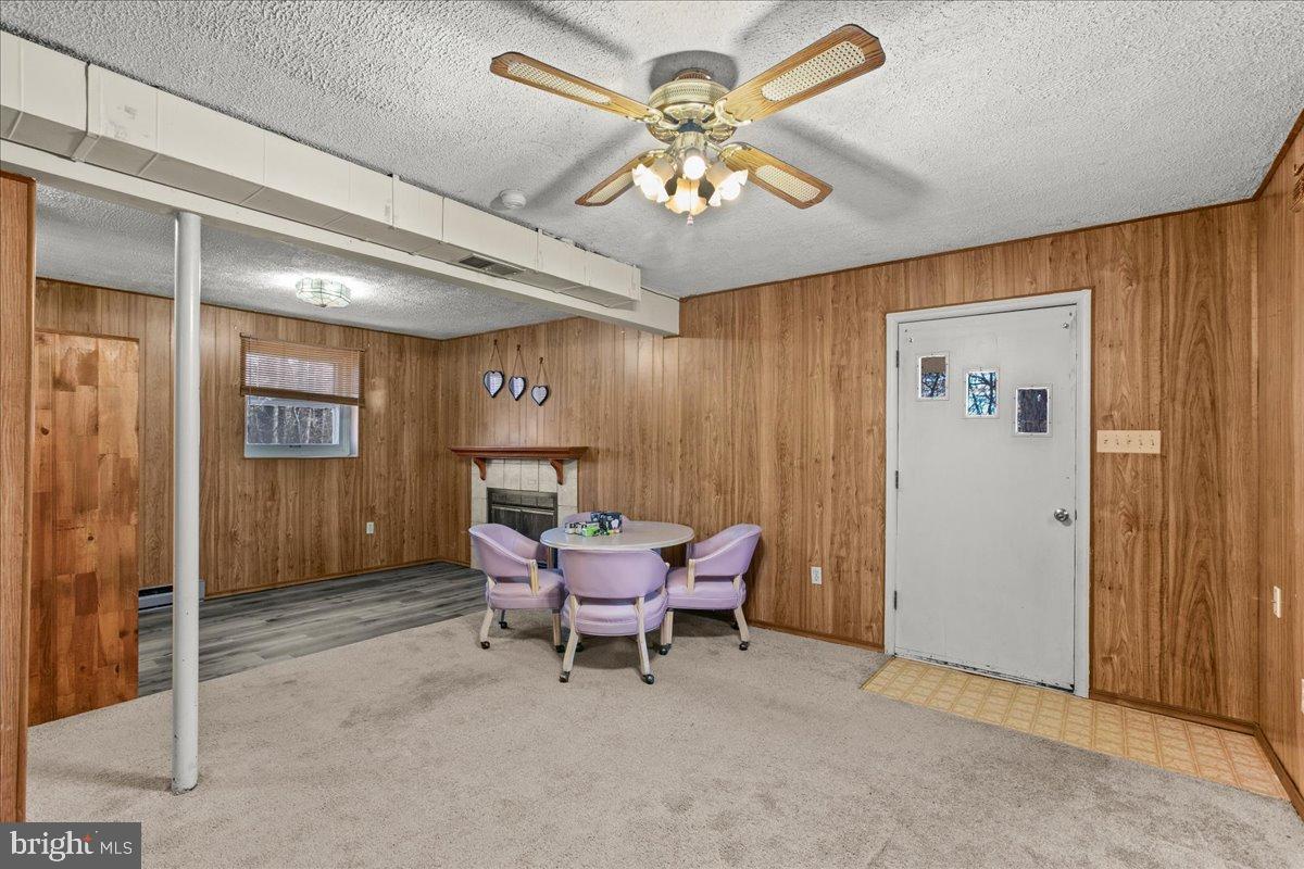 9442 Brentsville Road Manassas, VA 20112 - Photo 30 of 34 Cozy gathering space with warm wood accents.