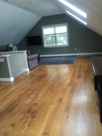 36 Rae Avenue Needham, MA 02492 - Photo 6 of 12 a view of empty room with wooden floor and fan