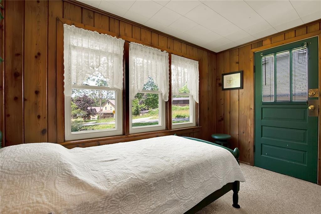 575 Stoystown Road Somerset, PA 15501 - Photo 11 of 26 a bedroom with a bed and a large window