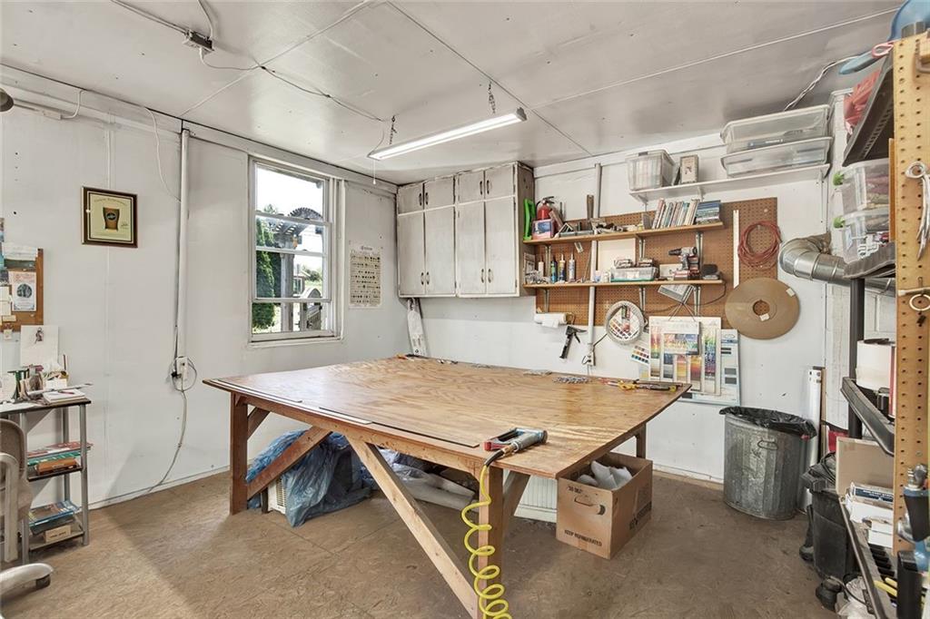 575 Stoystown Road Somerset, PA 15501 - Photo 22 of 26 a room with gym equipment and a table