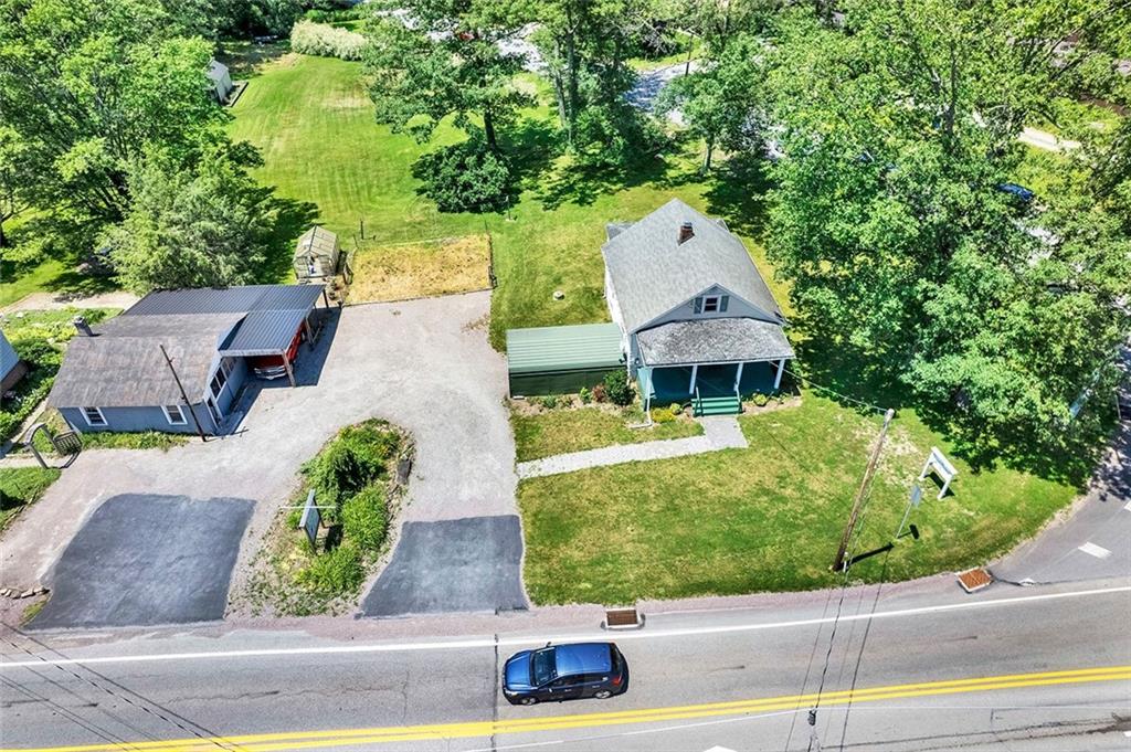 575 Stoystown Road Somerset, PA 15501 - Photo 23 of 26 an aerial view of a house with a yard and potted plants
