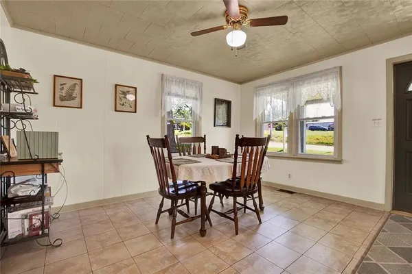 a view of a dining room with furniture