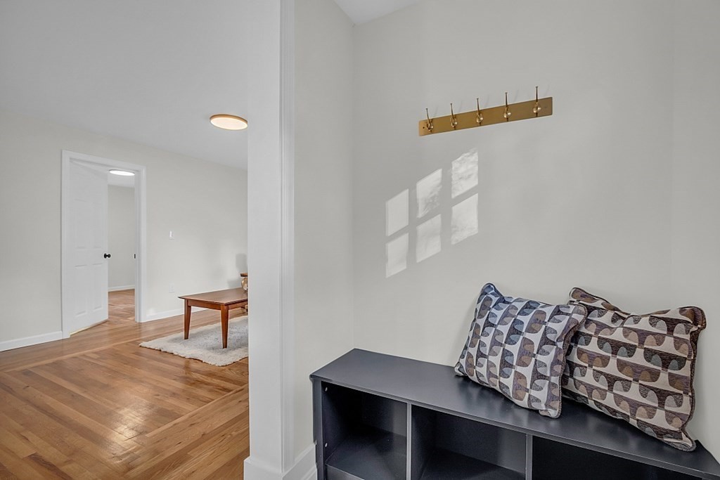 102 Turnpike Road Ashby, MA 01431 - Photo 21 of 40 a room with furniture and a wooden floor