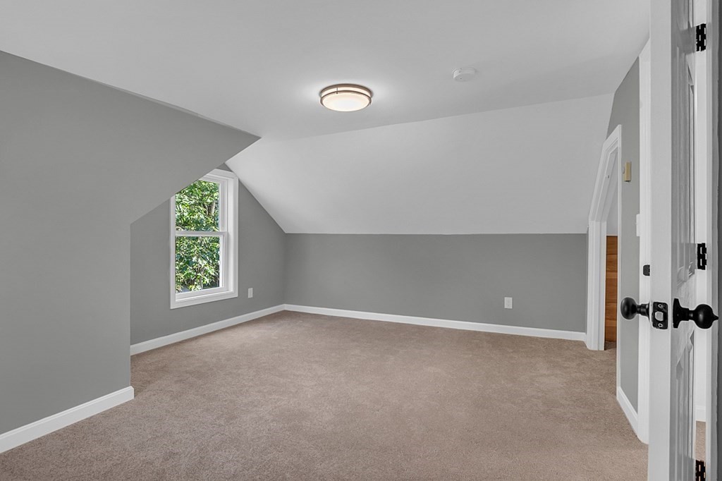 102 Turnpike Road Ashby, MA 01431 - Photo 25 of 40 an empty room with windows and closet