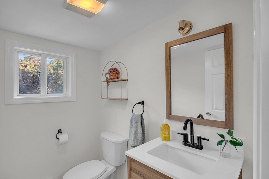 102 Turnpike Road Ashby, MA 01431 - Photo 28 of 40 a bathroom with a toilet sink and mirror