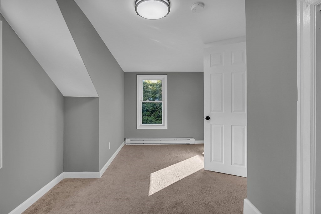 102 Turnpike Road Ashby, MA 01431 - Photo 30 of 40 a view of an empty room with a window