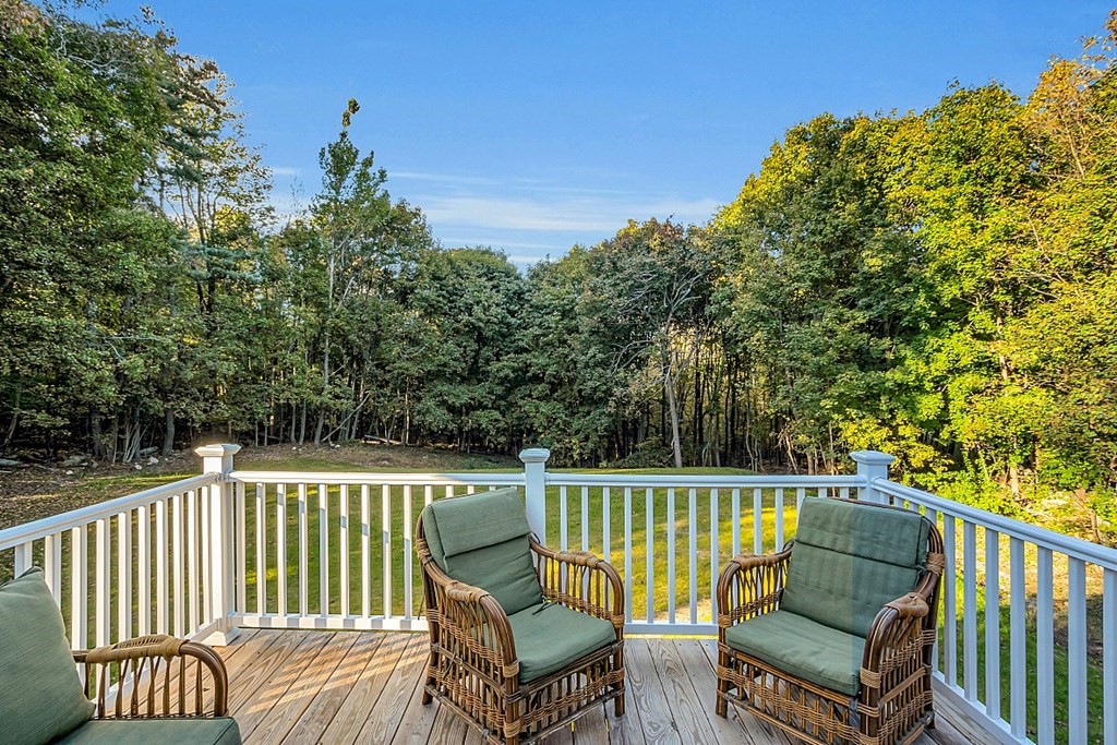 102 Turnpike Road Ashby, MA 01431 - Photo 32 of 40 a view of a chair and table on the deck
