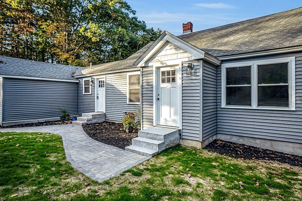 102 Turnpike Road Ashby, MA 01431 - Photo 36 of 40 a view of a house with a yard