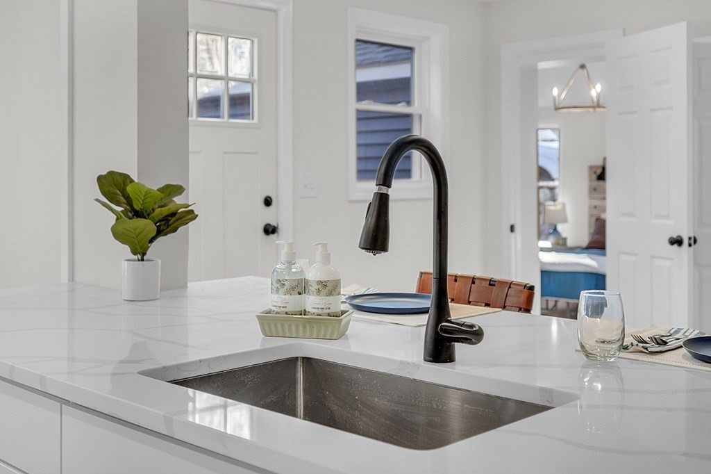 102 Turnpike Road Ashby, MA 01431 - Photo 6 of 40 a kitchen counter with sink and a window