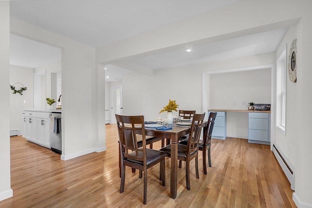 102 Turnpike Road Ashby, MA 01431 - Photo 9 of 40 a view of a dining room with furniture and wooden floor