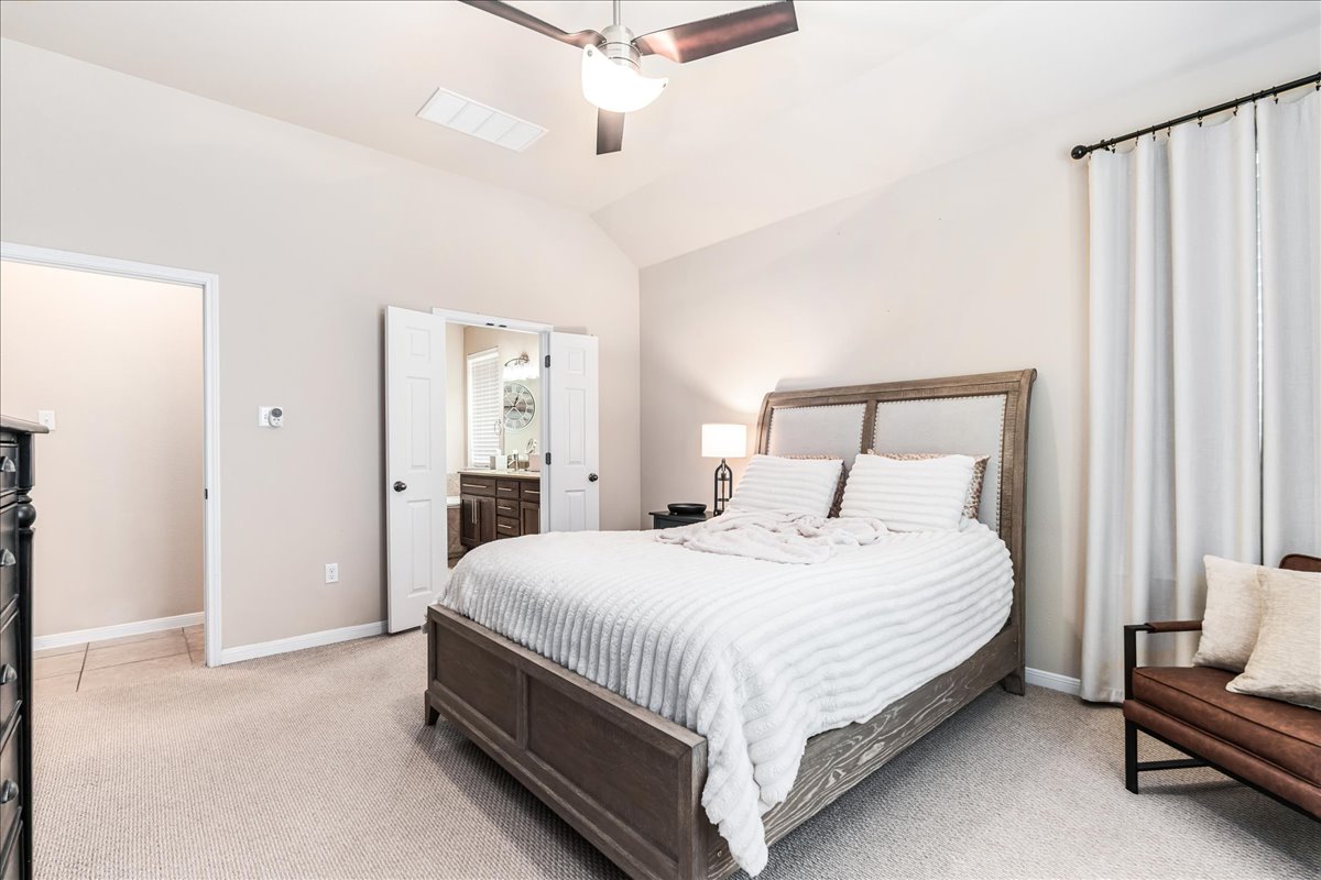 137 Navigator Drive Austin, TX 78717 - Photo 11 of 18 a bedroom with a bed and window