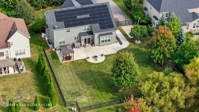 an aerial view of a house with garden