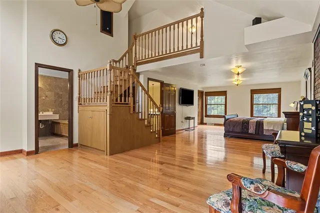 a view of a livingroom with furniture and a flat screen tv