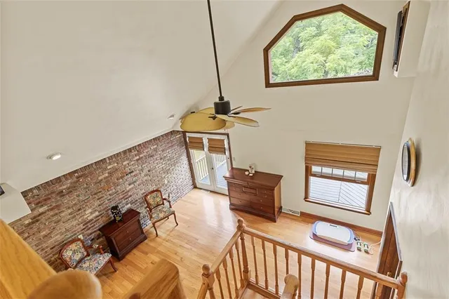 a bedroom with bed and a window