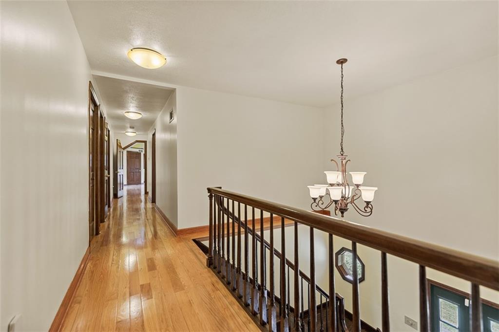 5150 Mamont Road Murrysville, PA 15668 - Photo 27 of 50 a view of a hallway with the chandelier