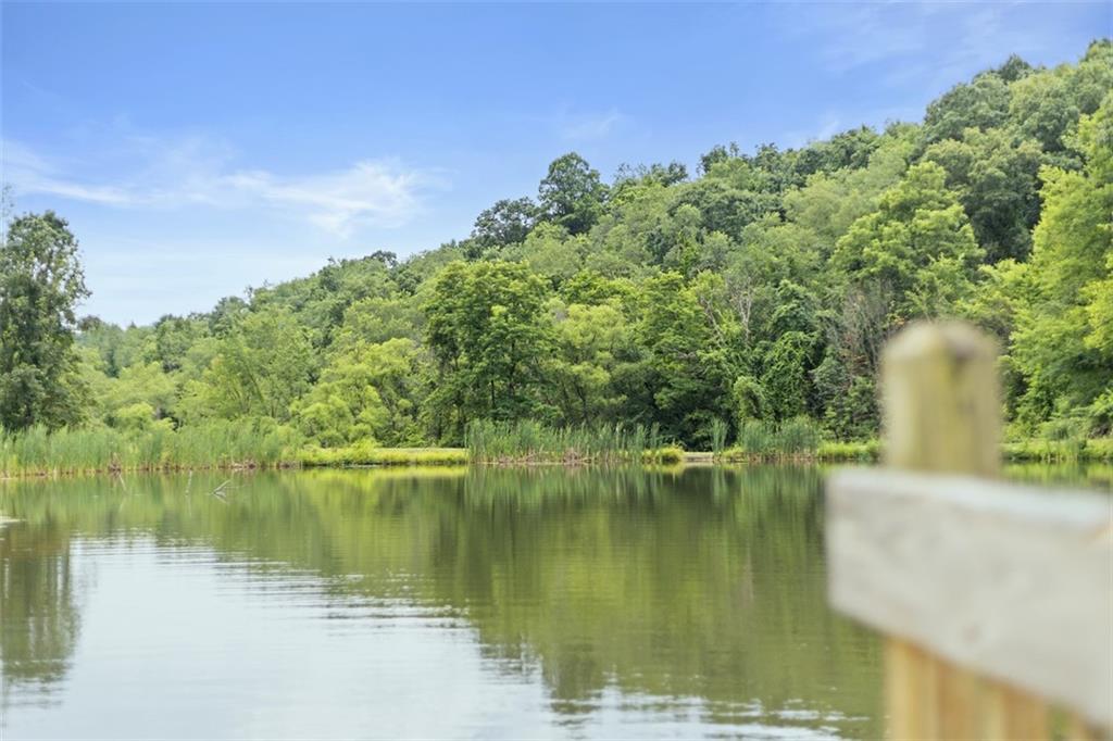 5150 Mamont Road Murrysville, PA 15668 - Photo 45 of 50 a view of a lake with a yard