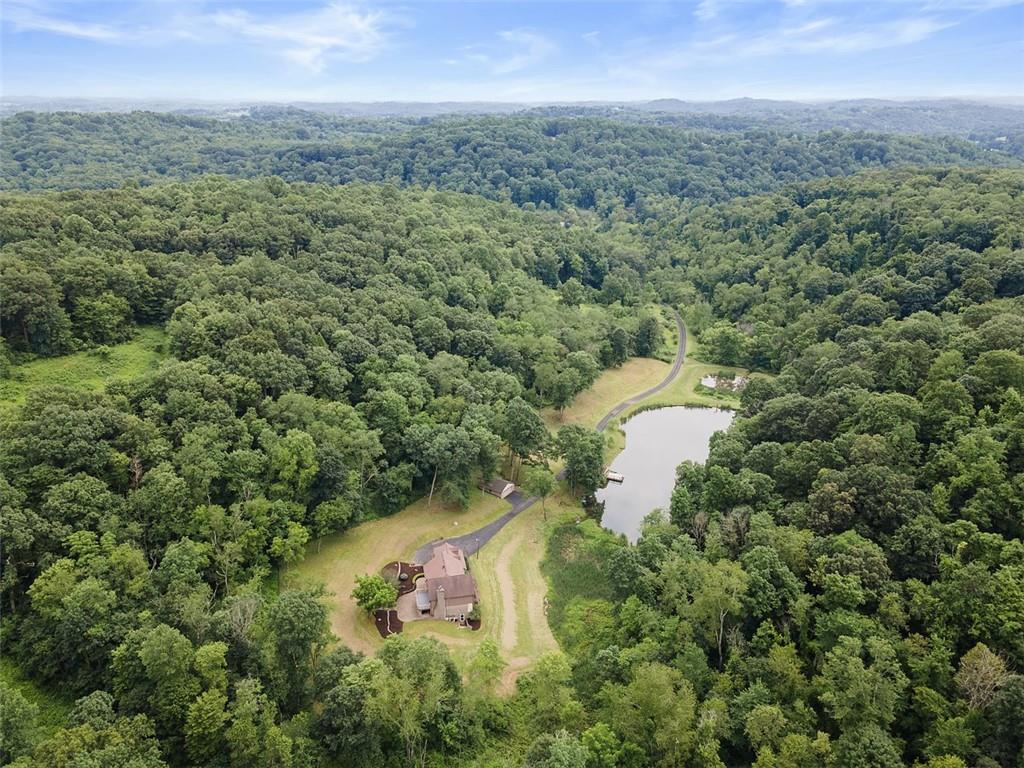 5150 Mamont Road Murrysville, PA 15668 - Photo 50 of 50 a aerial view of a house with a yard and large trees
