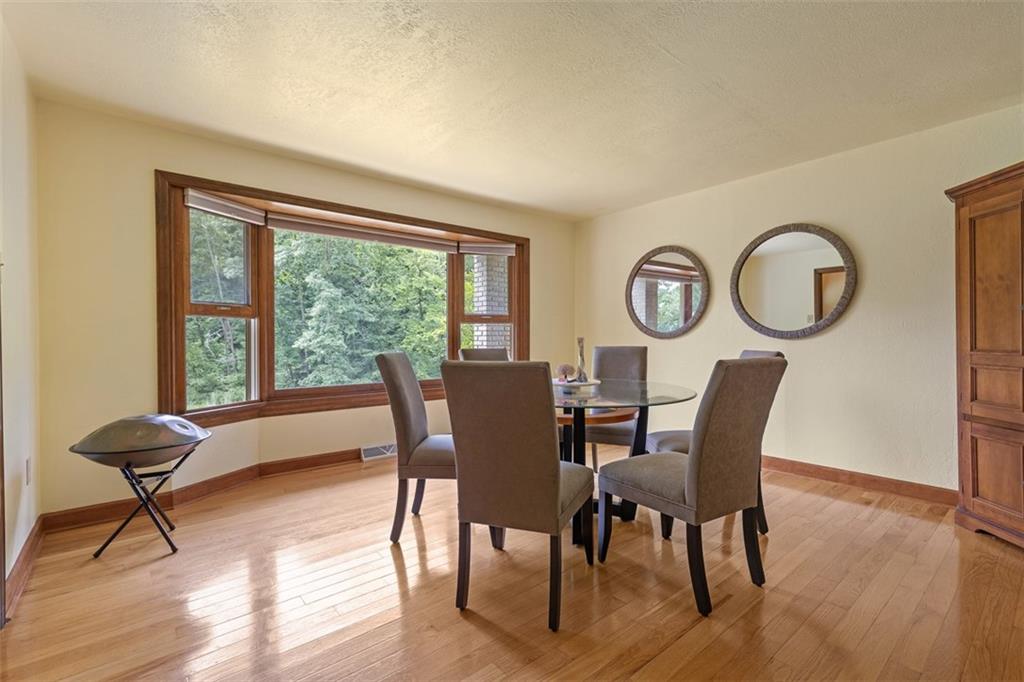 5150 Mamont Road Murrysville, PA 15668 - Photo 5 of 50 a view of a dining room with furniture window and wooden floor