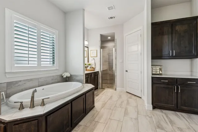a bathroom with a sink and a bathtub