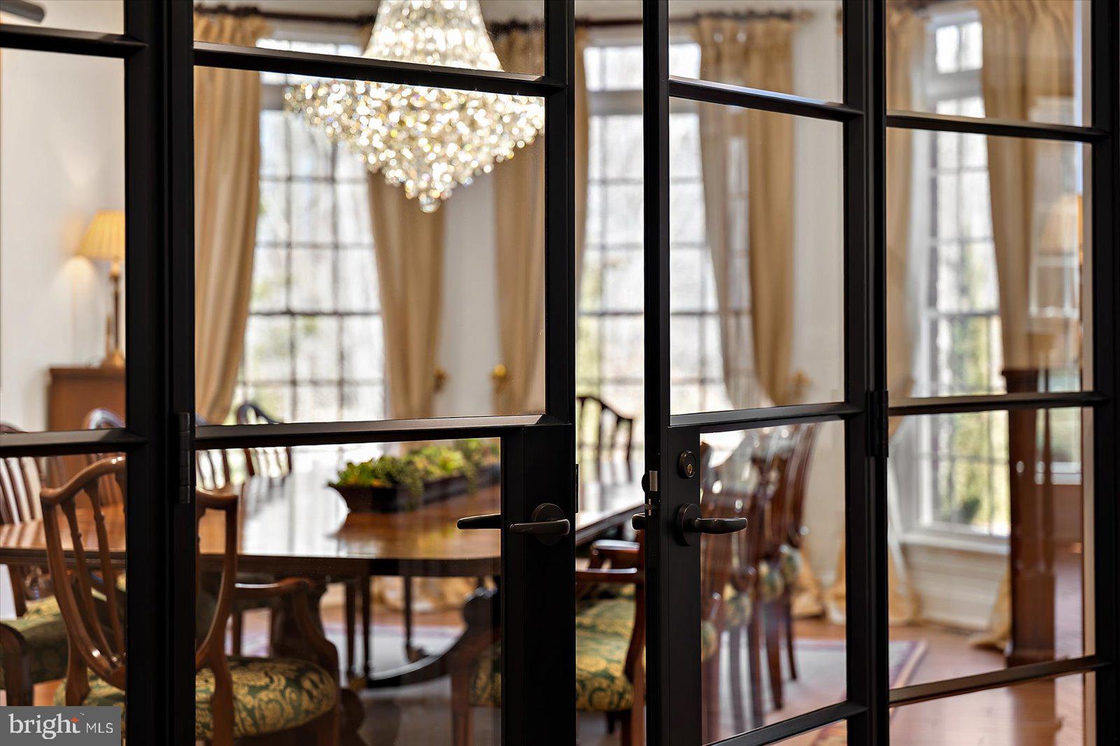 17 Perder Lane Edgewater, MD 21037 - Photo 12 of 115 Folding glass & metal double doors, elegant dining