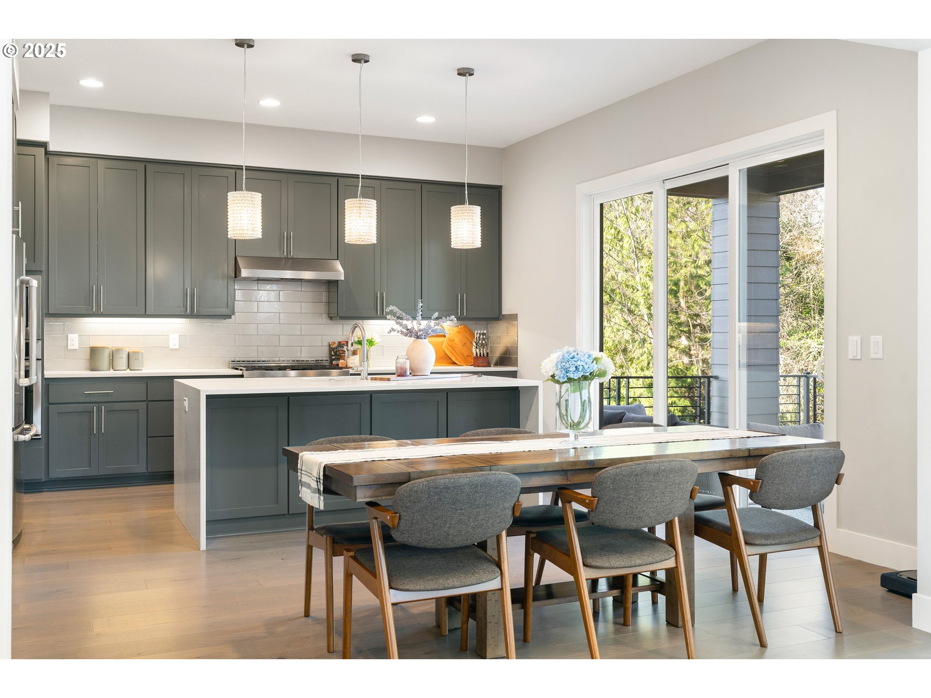 10805 Northwest Cornell Road Portland, OR 97229 - Photo 14 of 39 a kitchen with a table and chairs in it