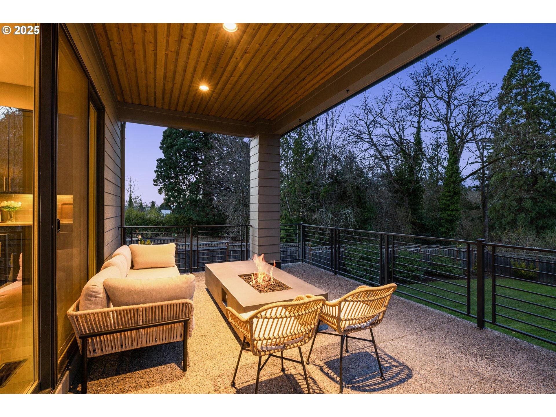 10805 Northwest Cornell Road Portland, OR 97229 - Photo 15 of 39 a outdoor sitting area with furniture and wooden floor