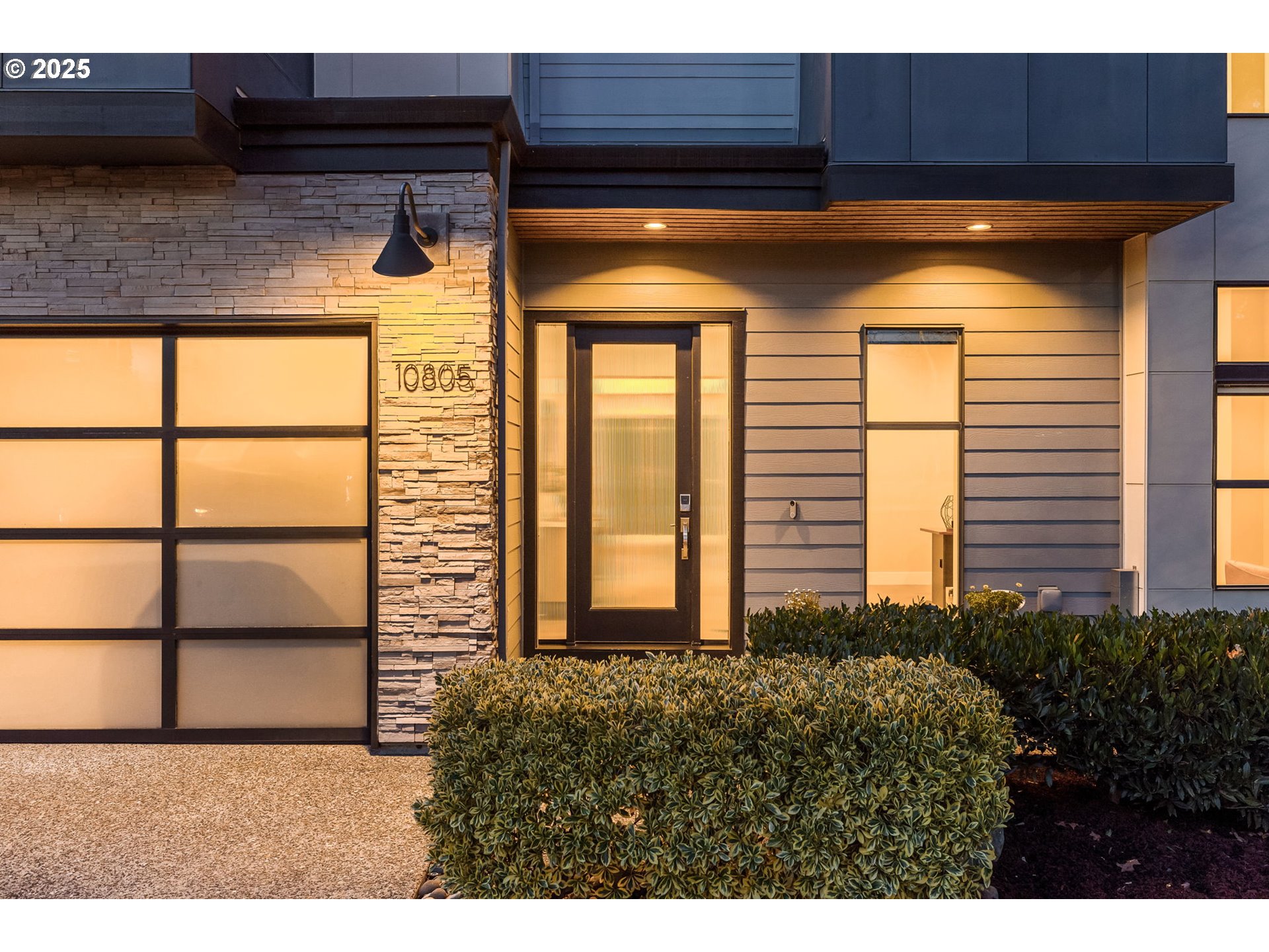10805 Northwest Cornell Road Portland, OR 97229 - Photo 2 of 39 a view of a house with a large window