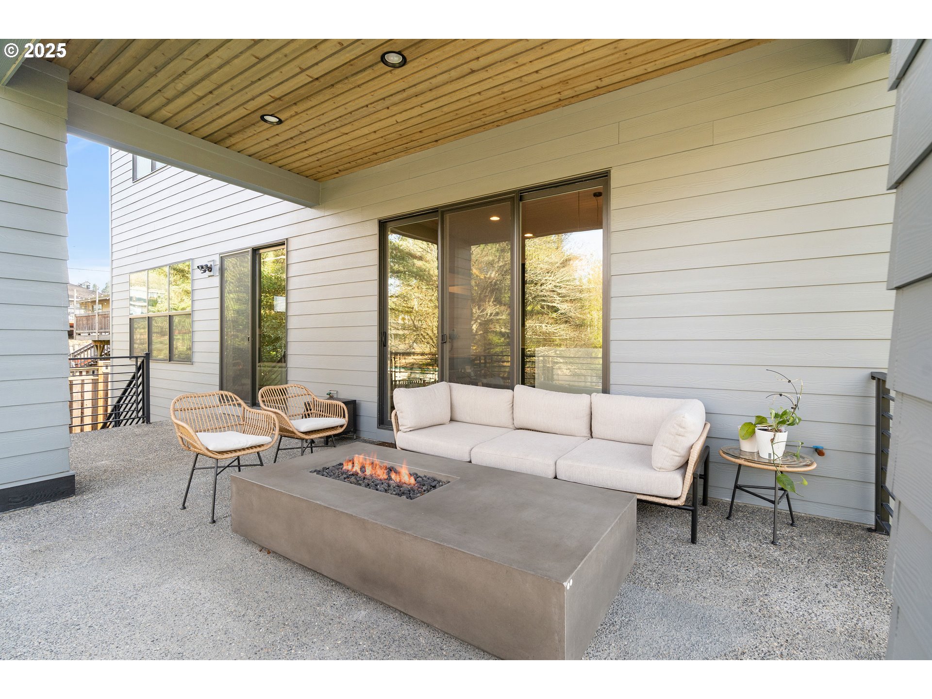 10805 Northwest Cornell Road Portland, OR 97229 - Photo 21 of 39 a living room with furniture and large windows