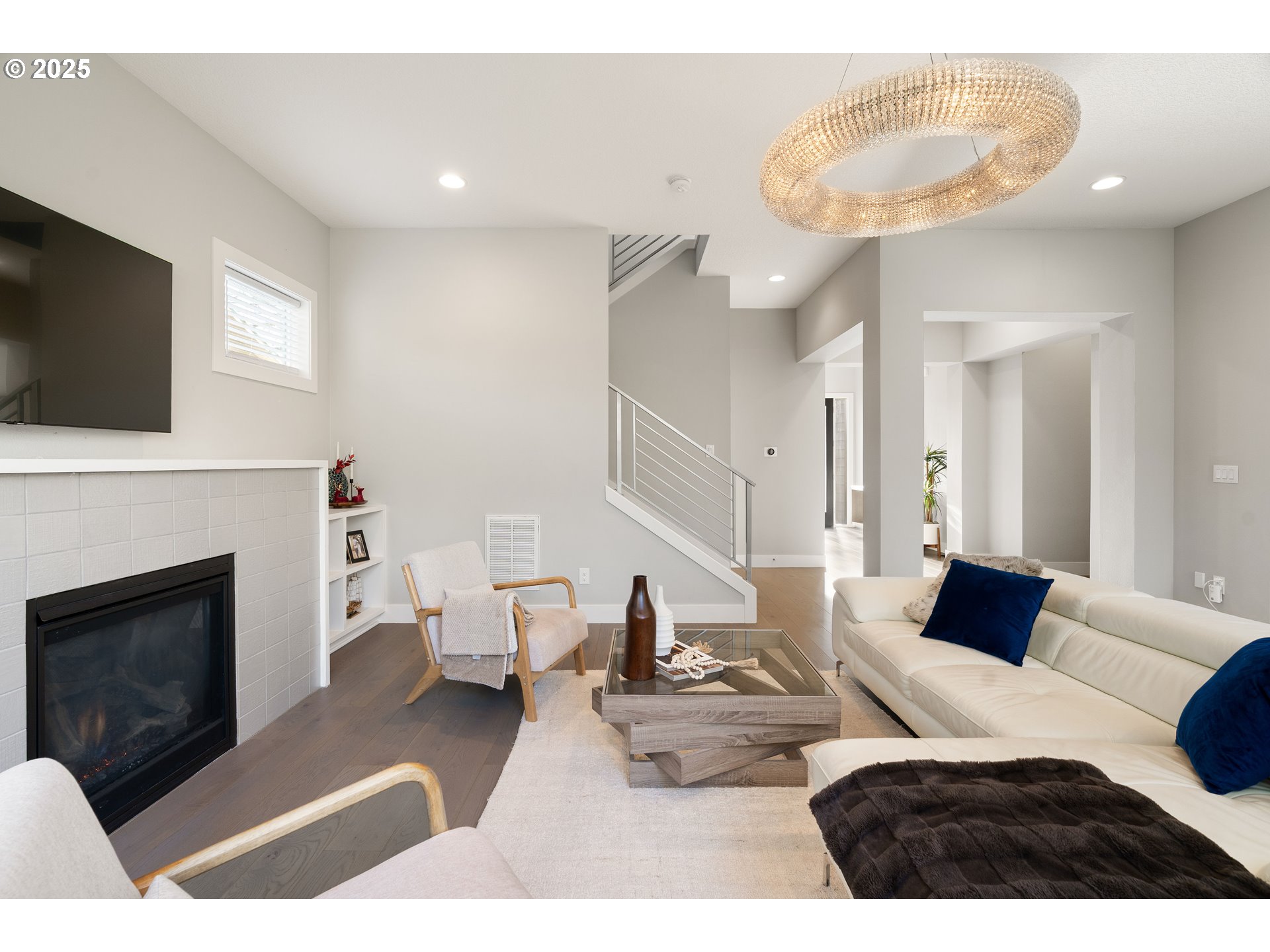 10805 Northwest Cornell Road Portland, OR 97229 - Photo 23 of 39 a living room with furniture and a fireplace