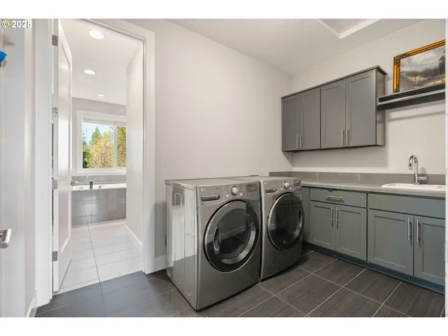 a living room with furniture ceiling fan and a window