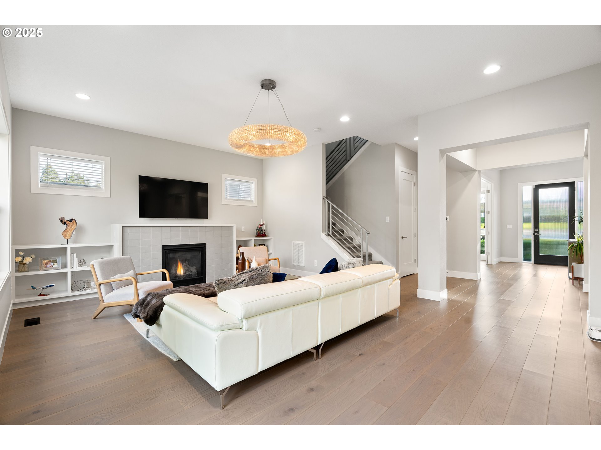 10805 Northwest Cornell Road Portland, OR 97229 - Photo 6 of 39 a living room with furniture and a fireplace