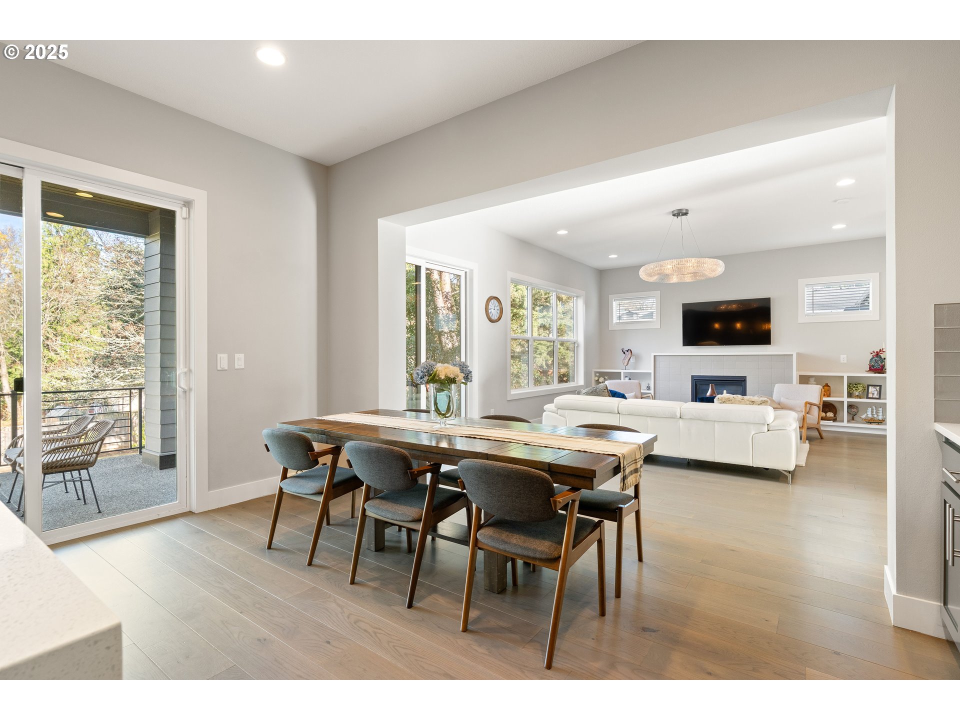 10805 Northwest Cornell Road Portland, OR 97229 - Photo 8 of 39 a view of a dining room with furniture and wooden floor