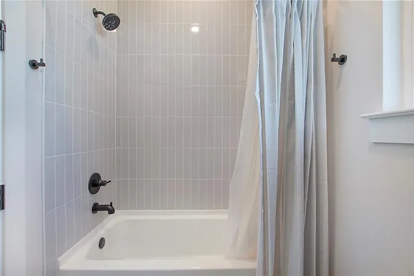 a bathroom with a bathtub