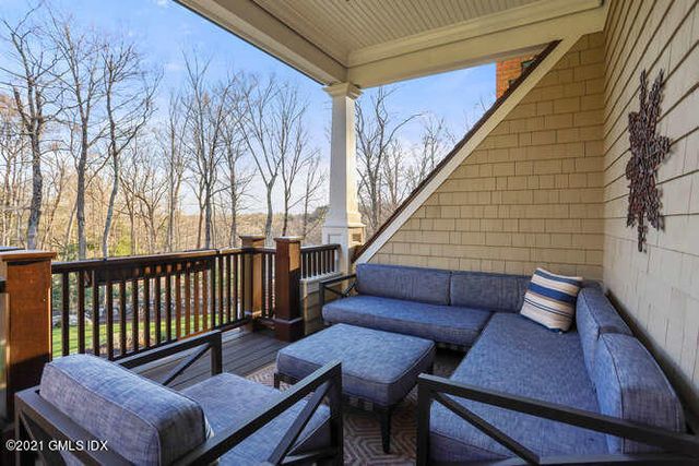 a outdoor living space with chairs